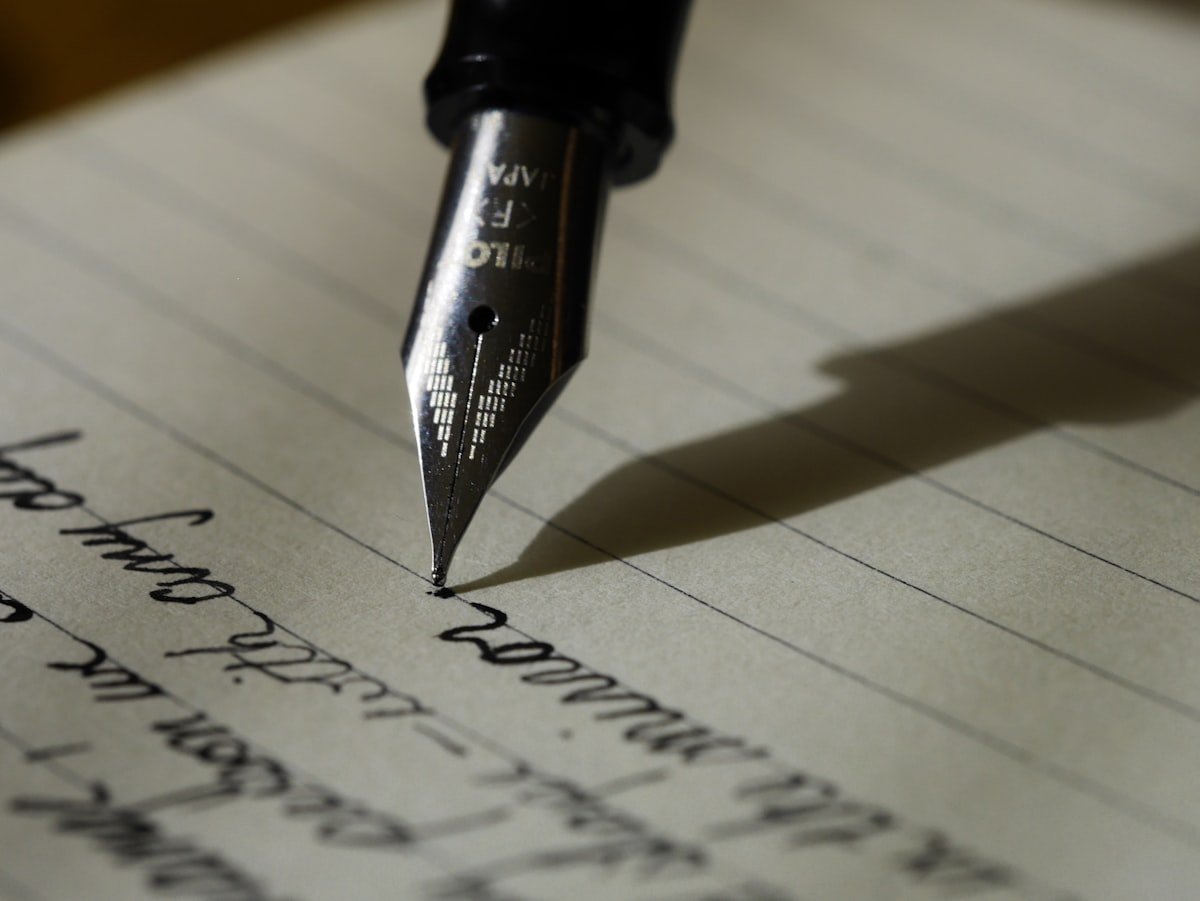 Fountain pen signing a document